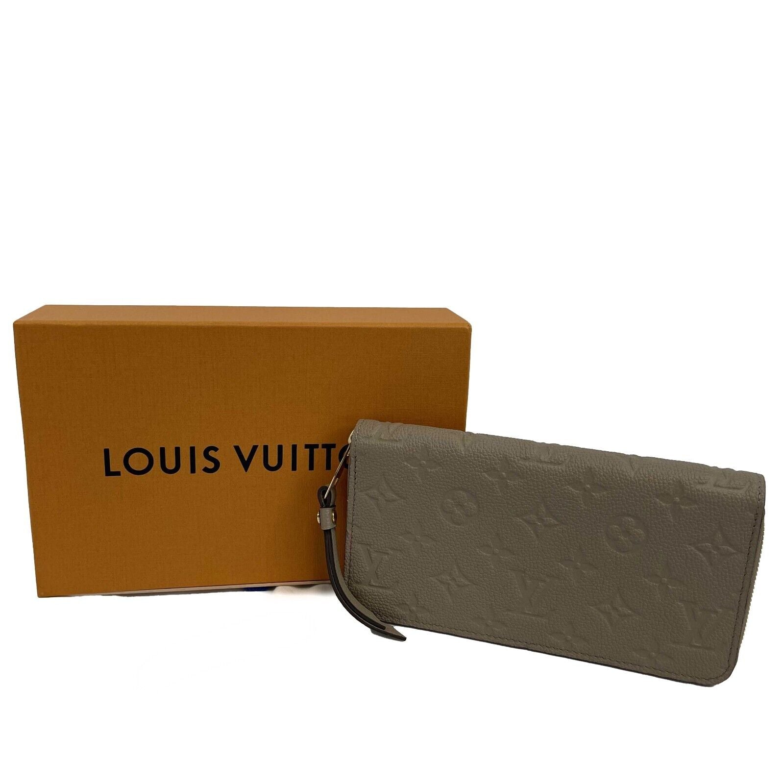 Louis Vuitton Brown Monogram Empreinte Zippy Wallet Beige Leather  ref.918355 - Joli Closet