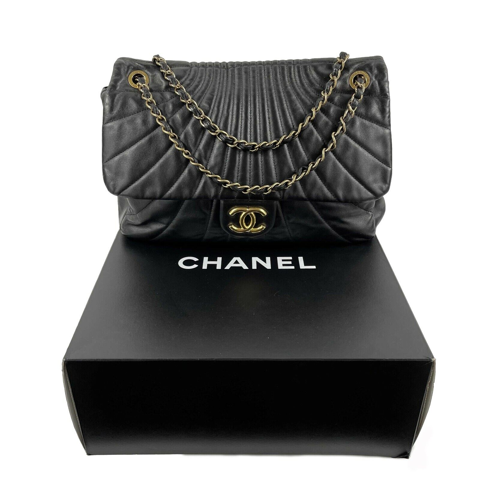 CHANEL - Wave Quilted Black Calfskin Leather Maxi Flap - Gold-tone Sho -  BougieHabit