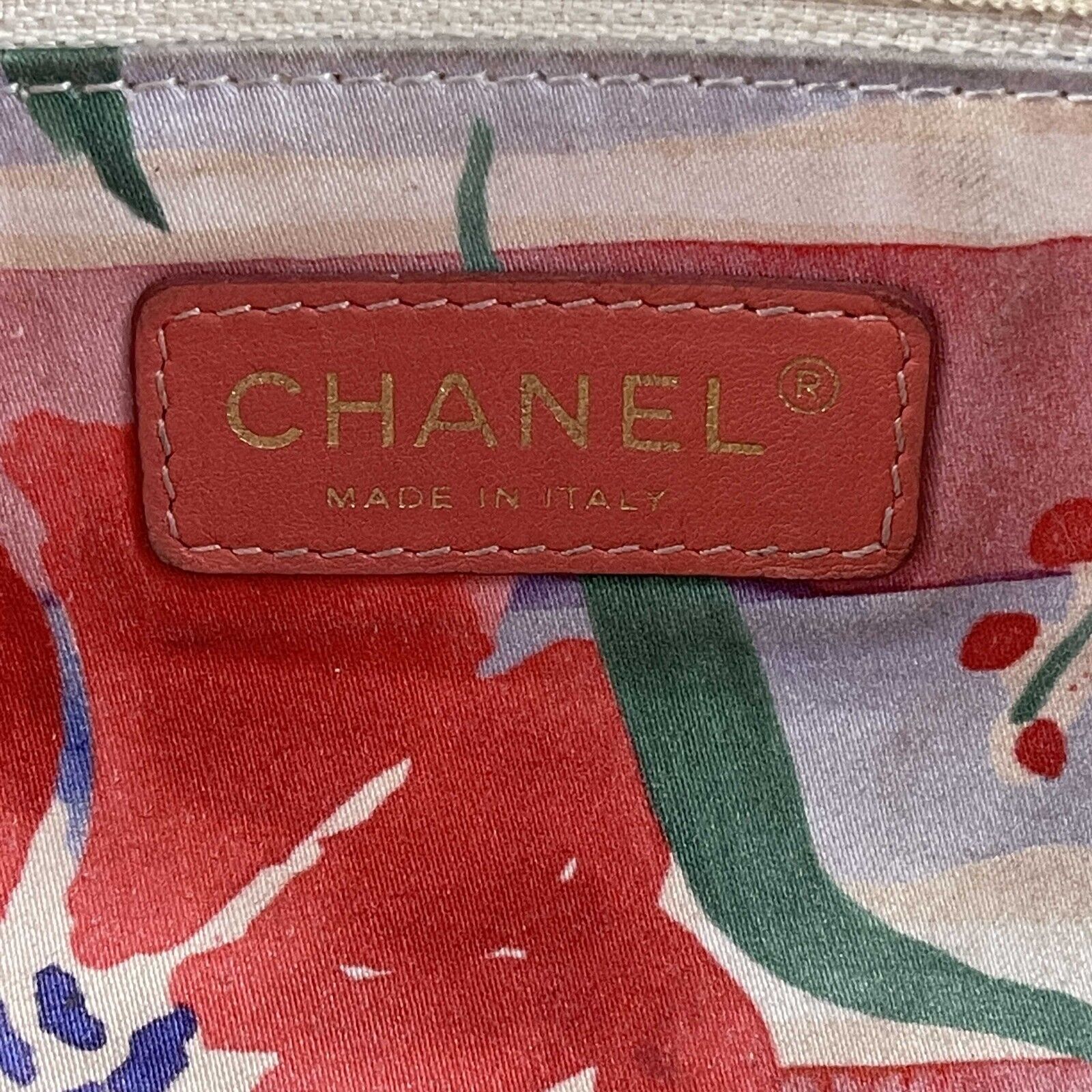 Vintage CHANEL red caviar skin wallet with large CC logo stitch